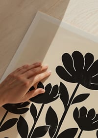 Silhouettes unite under large flowers, creating togetherness-3