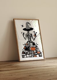 Mysterious witch surrounded by symbols of Halloween and magic-8