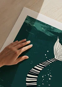 A siren with a striped fin floats through the deep blue sea-9