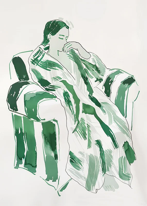 A woman in green harmony, calmly sunk in an armchair-12