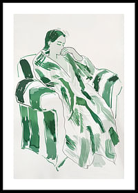 A woman in green harmony, calmly sunk in an armchair-0