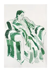 A woman in green harmony, calmly sunk in an armchair-1