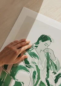 A woman in green harmony, calmly sunk in an armchair-9