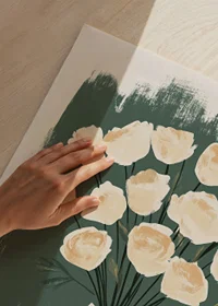 Beautiful roses in creamy tones against a deep green background-3