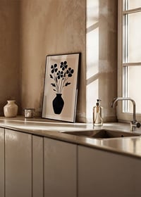 Black silhouette flowers in simple elegance against a light background-8