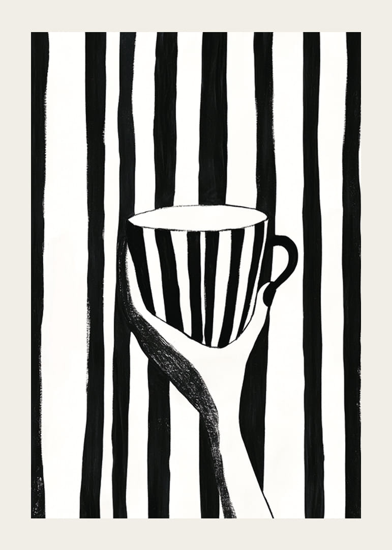 A hand holds a striped cup in black and white pattern-12