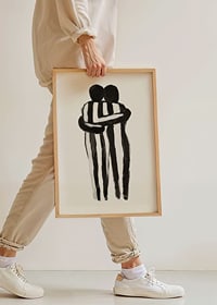 An expressive hug in monochrome art creates tranquility and warmth-8