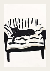 A cat lies calmly on a striped sofa, creating a harmonious feeling-3