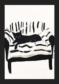 A cat lies calmly on a striped sofa, creating a harmonious feeling-5