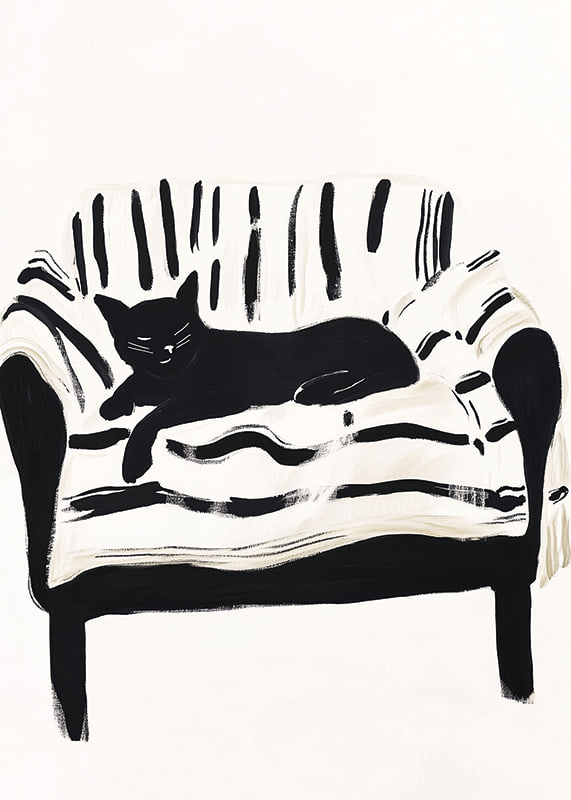 A cat lies calmly on a striped sofa, creating a harmonious feeling-12