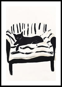 A cat lies calmly on a striped sofa, creating a harmonious feeling-0