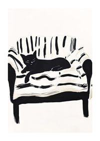 A cat lies calmly on a striped sofa, creating a harmonious feeling-1