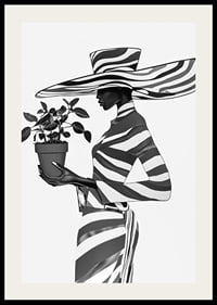 An elegant silhouette in black and white with a plant in her hand-2