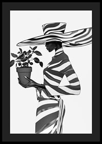 An elegant silhouette in black and white with a plant in her hand-4