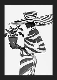 An elegant silhouette in black and white with a plant in her hand-5