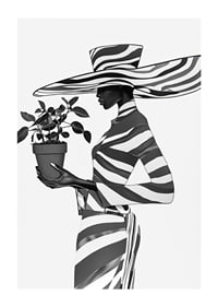 An elegant silhouette in black and white with a plant in her hand-1