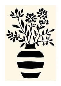 En elegant silhuet af blomster i en sort og hvid vase-1
