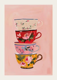 Fyra färgglada tekoppar i harmoni på en mjuk rosa bakgrund-3