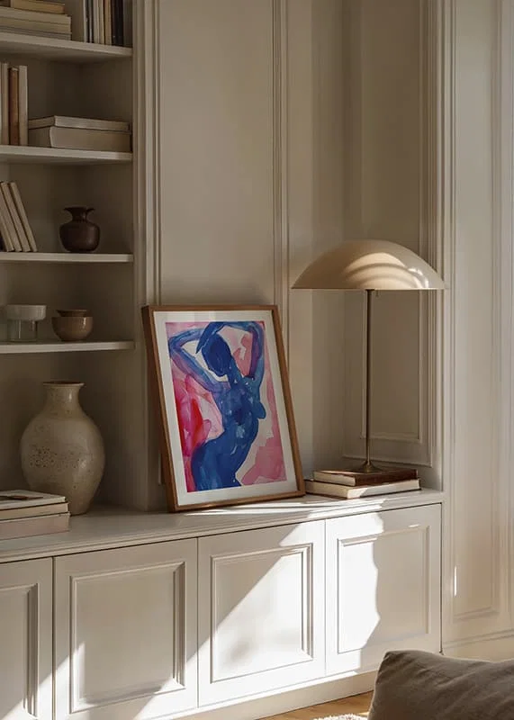 A blue silhouette dances elegantly against a background of pink tones-12