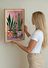 Colorful plants in patterned pots against a pink background-2