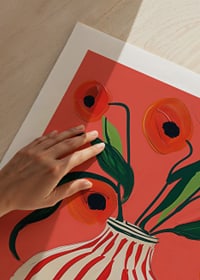 Colorful poppy flowers in striped vase against vibrant background-9