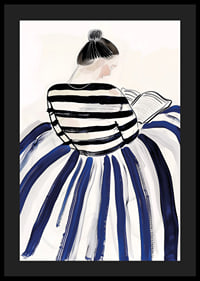 A woman in elegant striped clothes immersed in a book-4