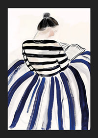 A woman in elegant striped clothes immersed in a book-5