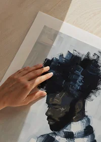 A man lost in a book, surrounded by muted blue tones-9
