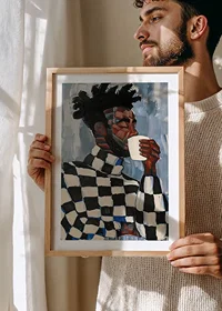 A man in plaid drinks coffee in an artistic expression-8