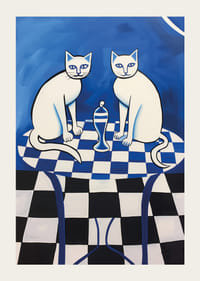 Two cats sitting on a blue-and-white checkered table-3