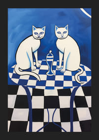 Two cats sitting on a blue-and-white checkered table-5