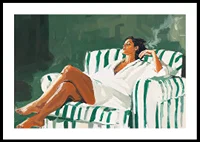 A relaxed lady in a striped armchair against a deep green background-0