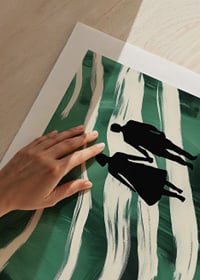 Silhouettes on a hand-in-hand walk through green, swirling streams-9