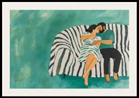 A couple rests together on a striped sofa, filled with harmony-2