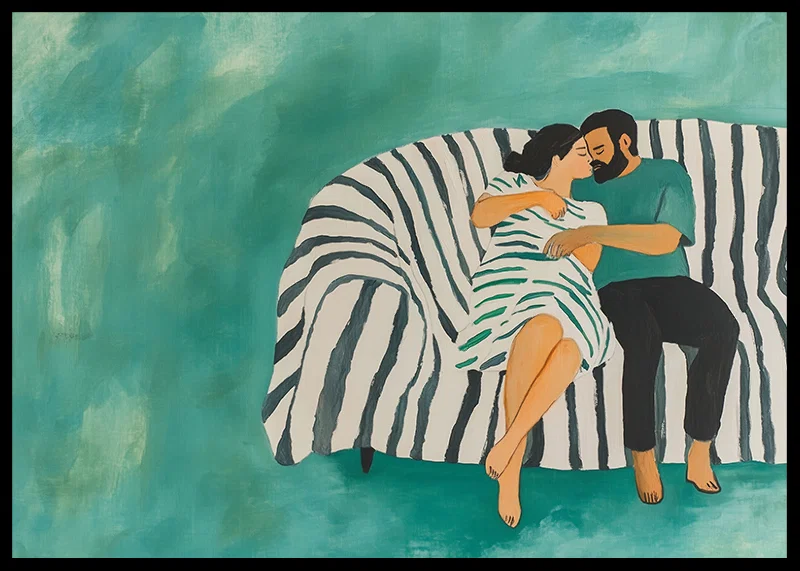A couple rests together on a striped sofa, filled with harmony-12