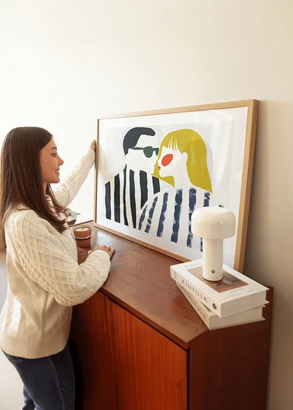 Contrasting couple in artistic stripes share an intimate moment-12