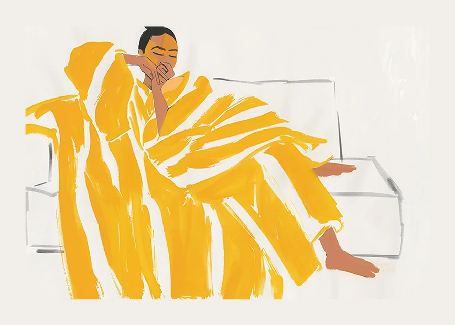 A relaxed moment in warm gold and soft tones creates peace-12