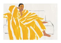 A relaxed moment in warm gold and soft tones creates peace-1