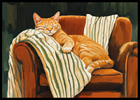 A cat sleeps peacefully in an armchair with a striped blanket-6