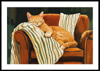 A cat sleeps peacefully in an armchair with a striped blanket-0