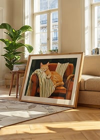 A cat sleeps peacefully in an armchair with a striped blanket-8