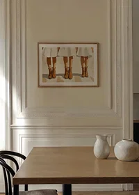 Three pairs of boots in harmony against white background-8