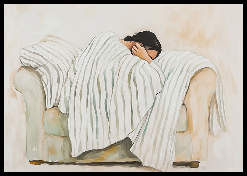 Une personne enveloppée dans une couverture rayée sur un fauteuil respire le calme et l'introspection-12