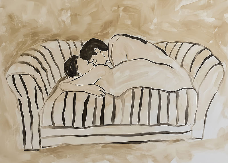 Two lovers in a tender embrace on a striped sofa-12