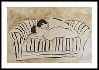 Two lovers in a tender embrace on a striped sofa-0