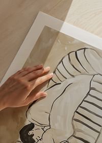 Two lovers in a tender embrace on a striped sofa-5