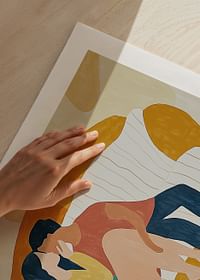 A loving couple rests on a stylized sofa in soft tones-5