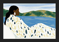 A woman rests by a peaceful lake with soft colors-5