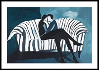 Two people in an intimate embrace on a striped sofa-0