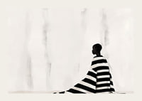 An elegant figure in black and white against a soft background-3